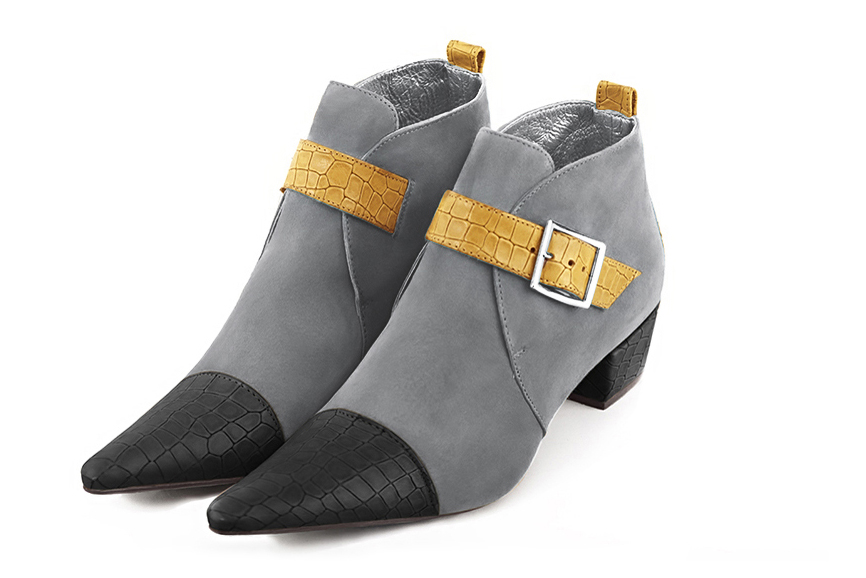 Dark grey and mustard yellow women's ankle boots with buckles at the front. Pointed toe. Low cone heels. Front view - Florence KOOIJMAN